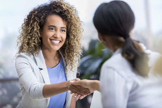 Two doctors shake hands